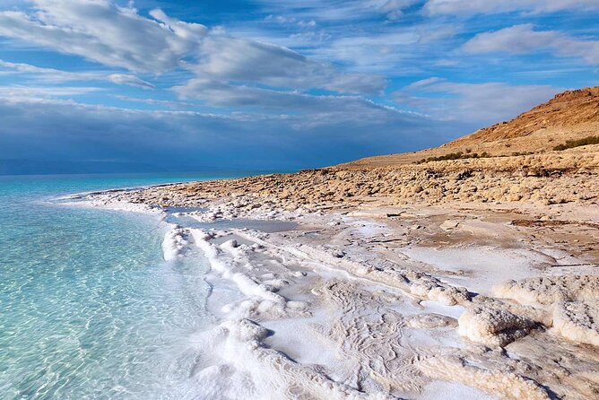 Best of Jordan Tour Amman Petra and Dead Sea with Camping at Wadi Rum - Wadi Rum trades carved stone for open desert