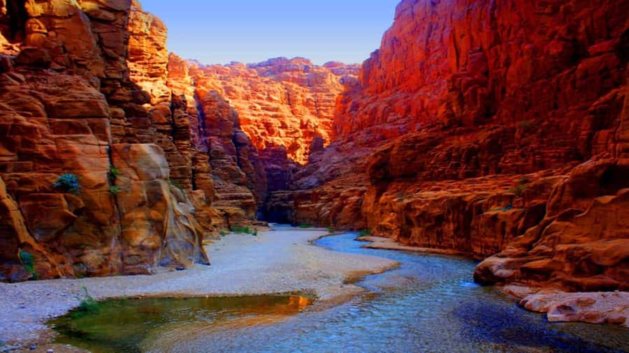 From Amman: Wadi Mujib Siq Trail Private Hiking Tour - Crossing the dam and entering the Siq