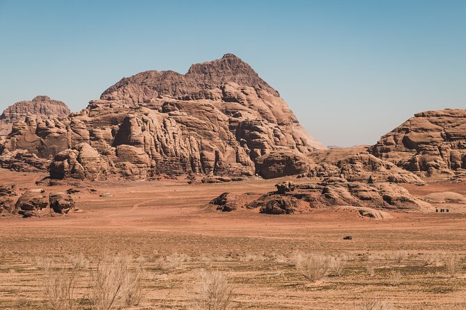 Full Day Jeep Tour and Overnight in Bedouin Camp with Meal - Mushroom Rock and distant Burdah Bridge