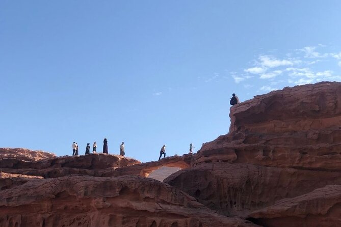 Full Day Jeep Tour & Traditional Lunch - Wadi Rum Desert Highlights - Mushroom Rock and Burdah Bridge from afar