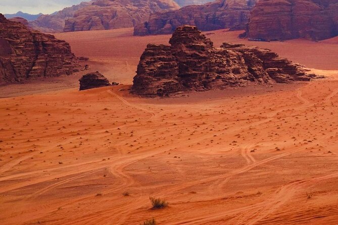 Full-Day Jeep Tour, Wadi Rum Desert Highlights - Khazali Canyon and ancient rock carvings