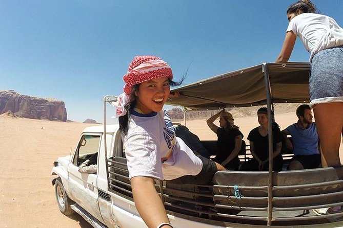 Half-Day Jeep Safari "Wadi Rum Highlights!" w/ Professional Bedouin Guide - Riding across the red sand