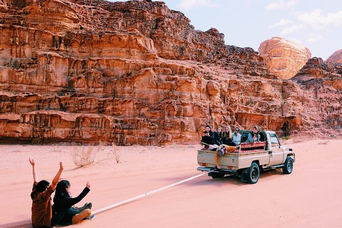 Half day Jeep Tour in Wadi Rum incl. water and Bedouin tea - Walking through Abu Khasaba Canyon