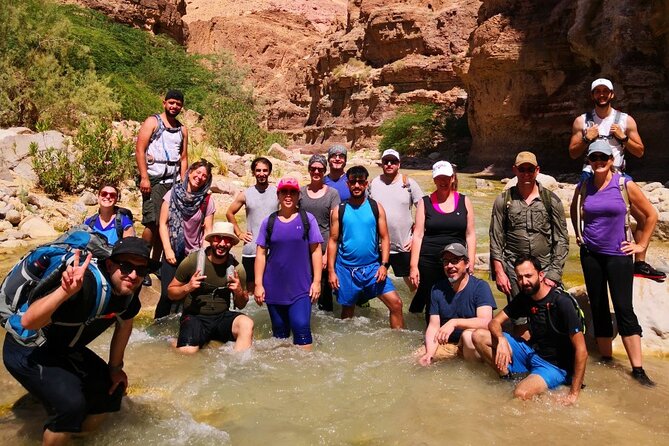 One Day Hiking Wadi Al Hasa Canyon - Walking beside cool water and sandstone walls