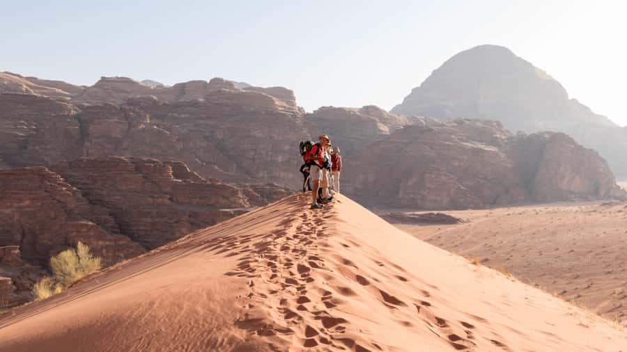 Wadi Rum: 10 Hour Jeep Tour Pass, Camel, Sandbording & Lunch - Meeting your Bedouin driver in the desert