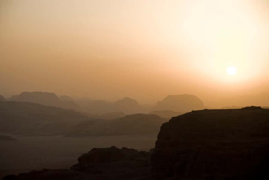 Wadi Rum: Explore 10-Hour Jeep Tour Pass, Guide, Meal & Stay - Red sand, rock walls, and open-air views