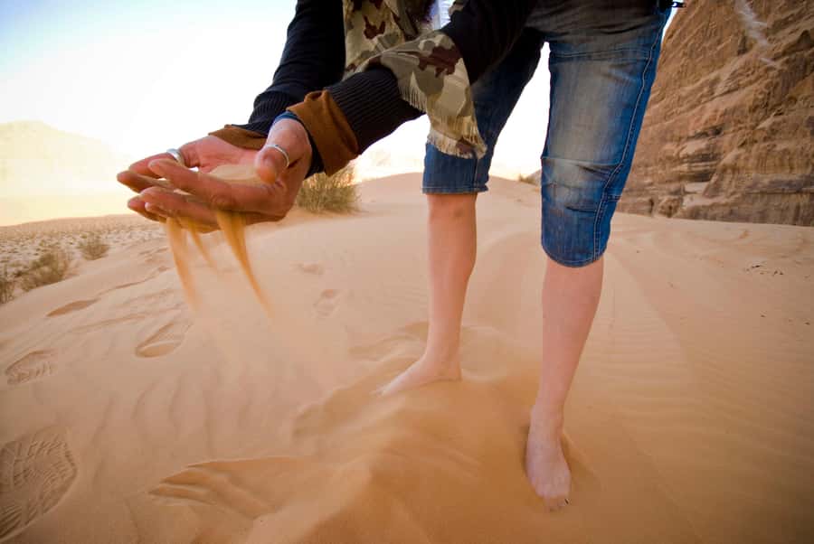 Wadi Rum: Explore 10-Hour Jeep Tour Pass, Guide, Meal & Stay - Sandboarding and time away from the jeep