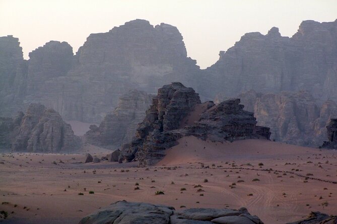 Wadi Rum: Explorer Jeep Tour PASS + Local Food + Optional Stay - Khazali Canyon and Wadi Rum’s inscriptions