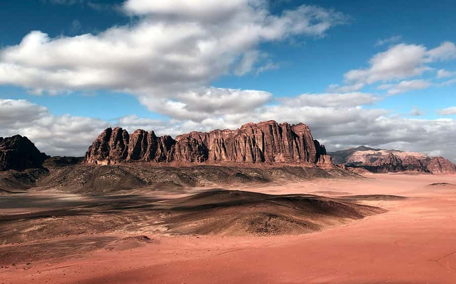 Wadi Rum:Full Day Tour Lunch Sand boarding Camel Ride Sunset - Khazali Canyon and the Thamudic inscriptions