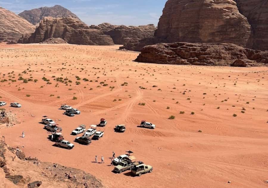 Wadi Rum:Full Day Tour Lunch Sand boarding Camel Ride Sunset - Lawrence Spring and the first desert views